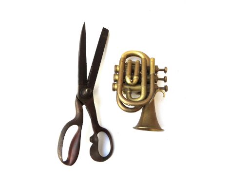 A pair of brass and steel tailor's shears by Wilkinson & Son, 40cm long, and a brass trumpet by Bessons & Co, 24cm long, (2).