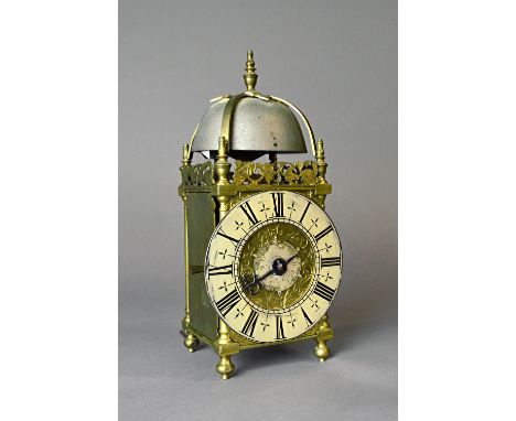 A rare and unusual late William & Mary brass miniature striking lantern clock with alarmBy Charles Goode, London, engraved wi