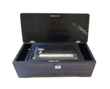 A rosewood and inlaid Swiss cylinder music box, the foliate parquetry inlaid lid opening to reveal a nine inch cylinder playi