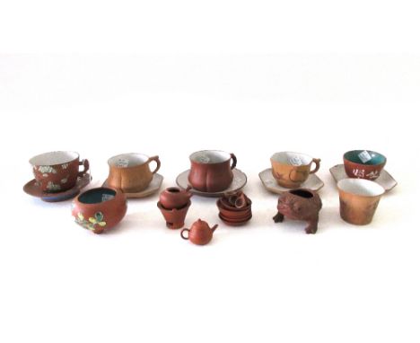 A group of Chinese Yixing teawares, 19th/20th century, comprising; four cups, two teabowls, five saucers, a sugar bowl, a min