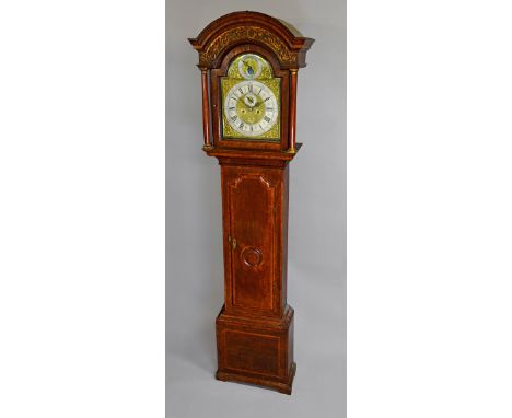 A late George II oak and fruitwood crossbanded longcase clockBy Thomas Ogden, Halifax, circa 1750The case with an arched moul