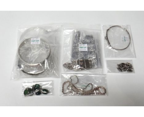 Mostly silver jewellery, comprising; four bangles, five gate bracelets, two bracelets, an amethyst set bangle, a brown paste 