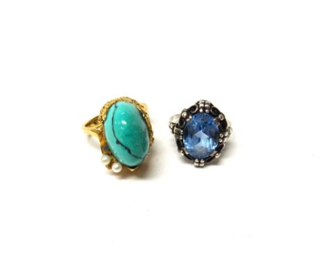 A gold ring, mounted with a turquoise matrix and with two cultured pearls, (five further cultured pearls lacking), ring size 