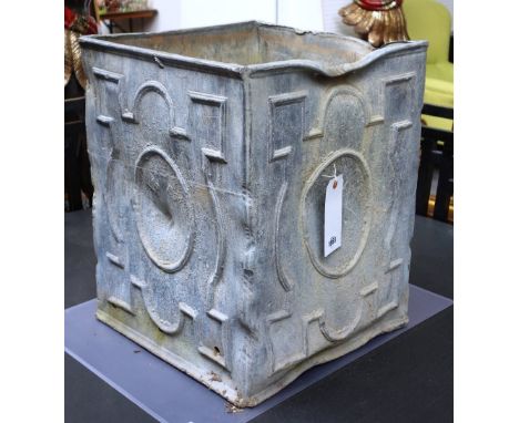 A square lead planter with geometric moulded decoration, 41cm wide x 52cm high. 