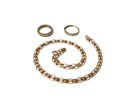 A 9ct gold oval link neckchain, on a boltring clasp, a 9ct gold and colourless gem set full eternity ring and a 9ct gold and 