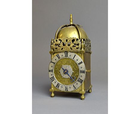 A rare brass miniature lantern timepiece with alarmLate 17th / early 18th century with later elementsThe posted frame surmoun