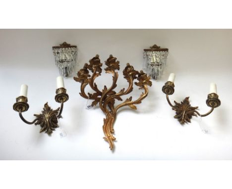A brass rococo style five branch wall light, a pair of two branch brass wall lights and a pair of lustre wall  lights with mi