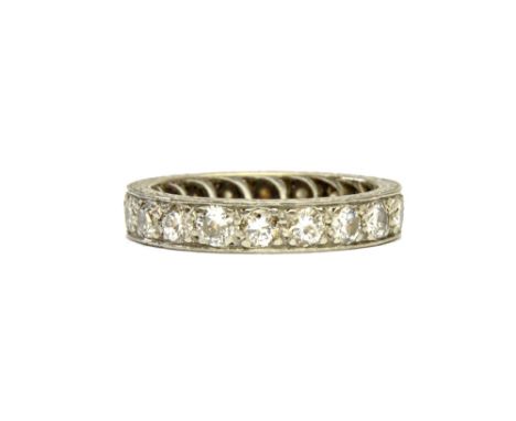 A platinum and diamond set full eternity ring, mounted with circular cut diamonds, detailed PLAT, the diamonds weigh approx 2