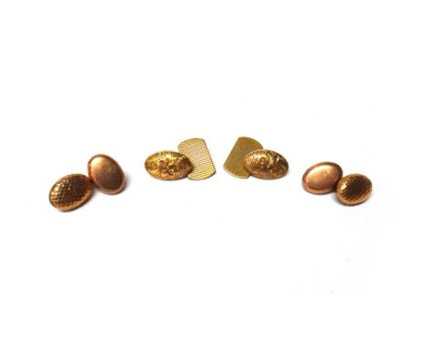 A pair of gold cufflinks, each with an oval front with martele decoration and with a plain oval back, detailed 15, gross weig