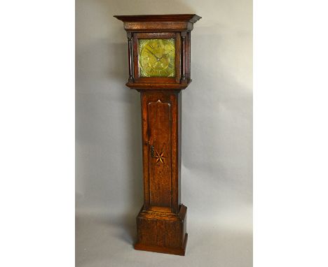 A George III oak cased 30 hour longcase clockBy Jeremiah Bullock, EllesmereThe case with a deep overhanging moulded pediment,