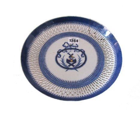A Chinese export  armorial part service, late 18th century, each piece painted in underglaze-blue and highlighted in gilding 