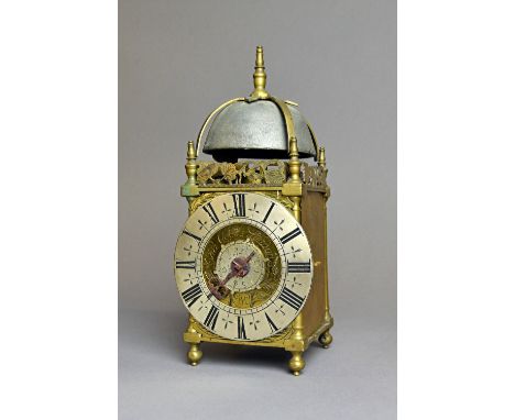 A rare and unusual late William & Mary brass miniature striking lantern clock with alarmBy Charles Goode, London, engraved wi