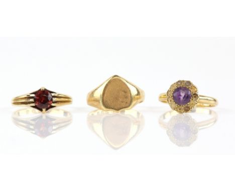 Late Victorian shield shaped signet ring, ring size M, red paste stone set ring, size R and amethyst seed pearl cluster ring,