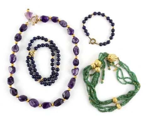 Multi strand emerald bead necklace, oval clasp and beads in gilt metal, 56cm in length, with a tumbled amethyst bead necklace