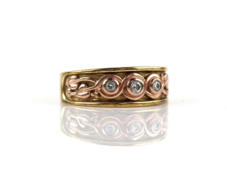 Clogau ring, set with three round brilliant cut diamonds, floral detailing, in 9 ct gold, ring size L9 ct gross weight 5.5 gr