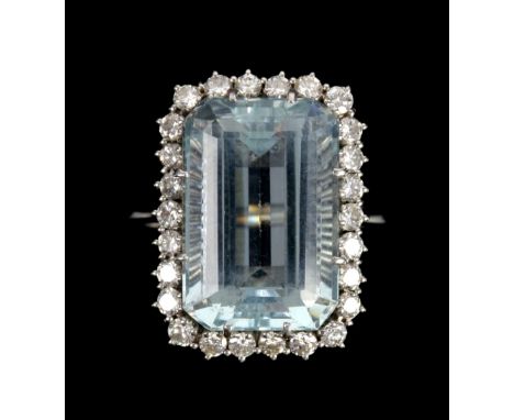 Aquamarine and diamond cocktail ring, rectangular step cut aquamarine, estimated weight 12.44 carats, surrounded by round bri