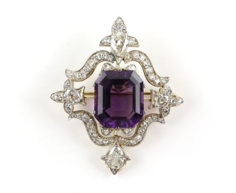 Amethyst and diamond brooch, central octagonal step cut amethyst, estimated weight 21.61 carats, surrounded by an ornate old 