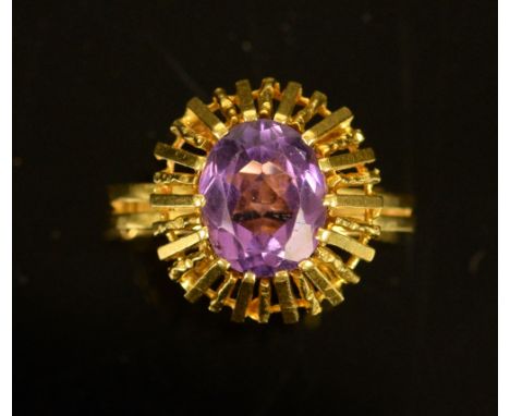 Vintage style amethyst ring, central oval cut amethyst, estimated weight 2.20 carats, textured and plain bar setting, mounted