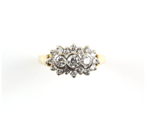 Modern diamond cluster ring, set with nineteen round brilliant cut diamonds, estimated total diamond weight 0.70 carats, moun