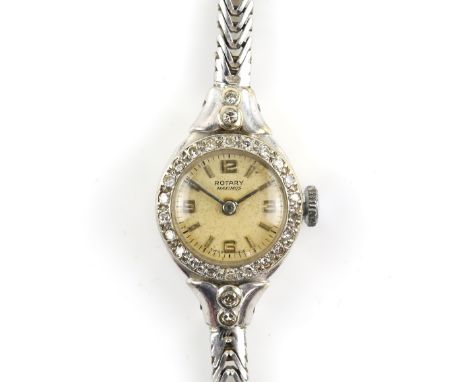 Ladies Rotary Maximus wristwatch, round dial with Baton hour markers and Arabic numerals, surrounded by a Swiss cut diamond s