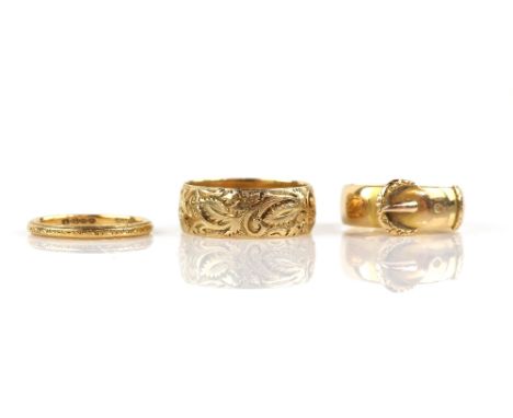 A 1930's engraved band, inside engraved 'Fidelity', hallmarked 22 ct, ring size L, a late Victorian buckle ring, hallmarked B