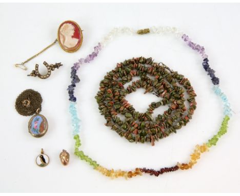 A quantity of costume jewellery, an acorn charm testing as 9 ct, seed pearl set horse shoe brooch, gilt metal locket, gilt me