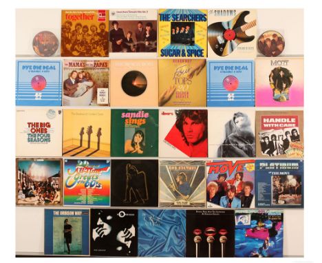 A collection of Classic Pop and Rock LPs and 7" Singles artists to include; The Beatles, The Beach Boys, Diana Ross, The Door