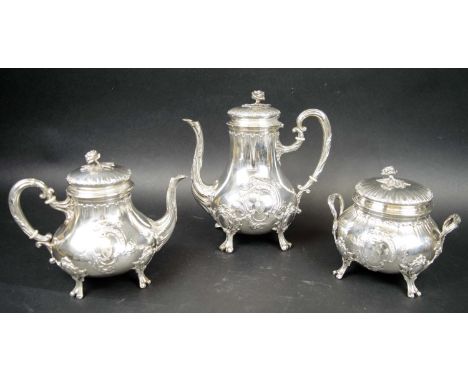 TEA AND COFFEE SERVICE, late 19th Century French silver, Rococo style, bears Fray Fhs maker's mark and Beguin R. de Choisell 