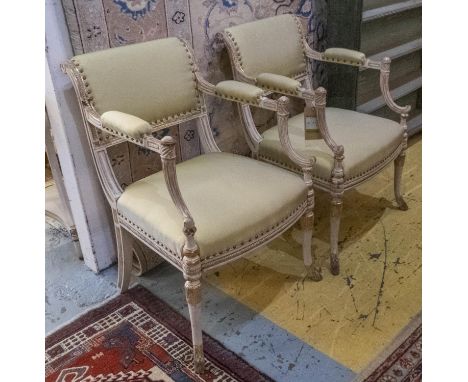 OPEN ARMCHAIRS, a pair, 53cm W x 87cm H, Regency cream painted and parcel gilt, circa 1810, with light green upholstery. (2) 