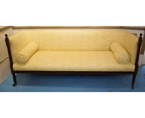 SOFA, 88cm H x 203cm W x 79cm D, 19th Century, mahogany and silvered metal studded in patterned yellow and tasseled fabric (f