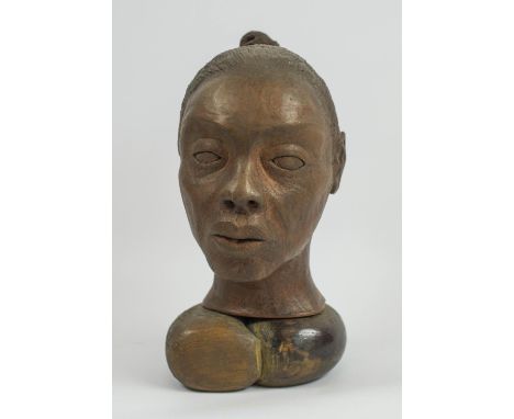 CONTEMPORARY AFRICAN SCHOOL, Ife manner, Male portrait of a young woman, terracotta on wooden base, 31cm H. 