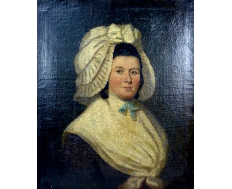 British School (19th century): a half length portrait of a woman in a bonnet, white shawl and blue bow tie over a black dress