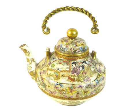 A fine Japanese Satsuma pottery teapot, Meiji period, with gilt metal swing handle, finely painted in enamels and gilt to the