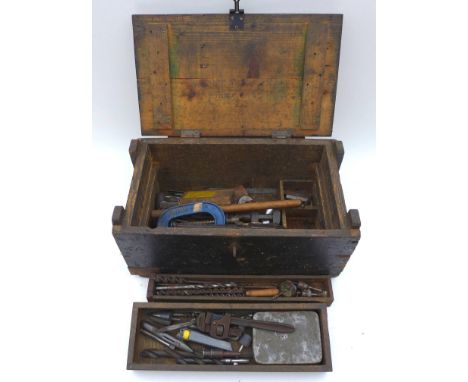 A wooden tool chest, containing a variety of hand tools, together with a further box containing hand tools. 