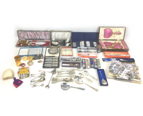 A collection of silver plated and steel flatware, some cased, including commemorative enamelled spoons, caddy spoon, carving 