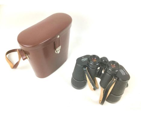 A pair of retro Zeiss Jena 10 x 50W multi-coated binoculars, with leatherette case, and manual. 