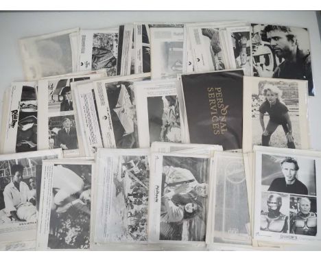 A quantity of circa 50 mixed black/white stills - titles include SUPERMAN IV, INDIANA JONES AND THE LAST CRUSADE, HARLEM NIGH