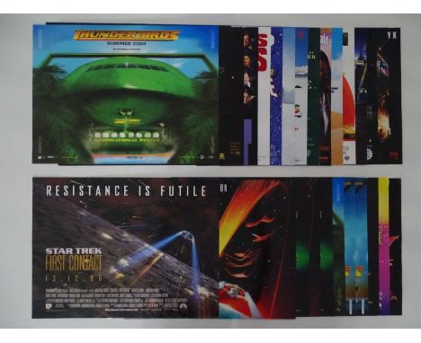 A large group of mini movie posters to include titles such as THUNDERBIRDS (2004), STAR TREK : FIRST CONTACT (1996), and many