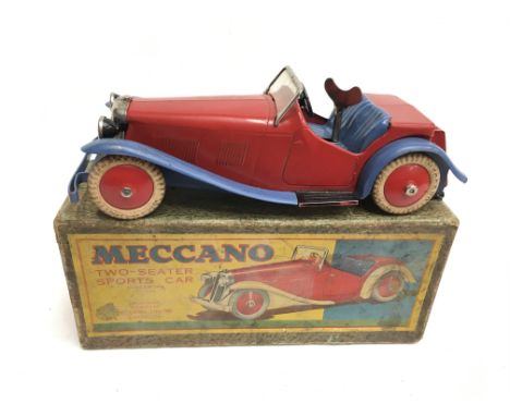 Meccano Two-Seater Sports Car: clockwork model in red and blue livery with steering wheel, headlights, plated radiator and wi