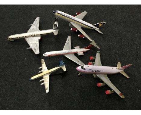 Five tinplate and plastic aircraft models, includes: tinplate 'Intercontinental' aircraft with friction drive wheels, wing sp