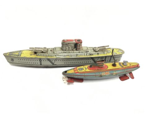 Marx 'HMS Edinburgh' tinplate battleship with tinprinted detailing, length 37cm (G). Together with HMS Nautilus British-made 