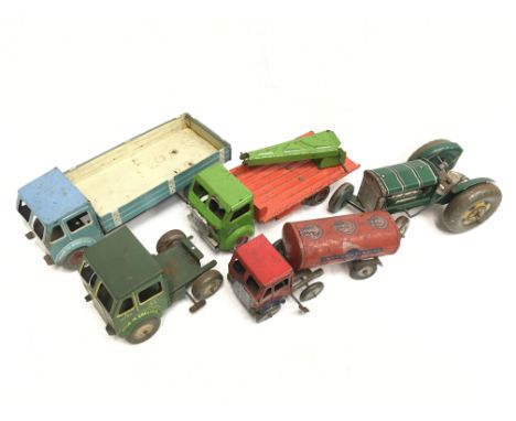 Mettoy (England) tinplate clockwork tipper truck, length 28cm, F, motor in working order. Together with four tinplate British