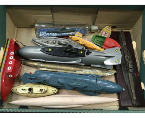 Selection of assorted submarine and boat models, includes miniature 'Grampus' submarine in glass bottle, length 30cm, and a w