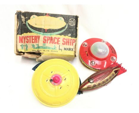 Three space related toys: Marx Mystery Space Ship, diameter 18.5cm (F in P box); British-made Space Ship, tinplate friction d