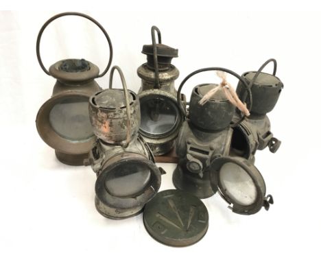 Five automobile lamps by Powell & Hanmer and others, in need of restoration. 