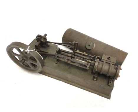 A heavy metal steam model with 5 inch flywheel, length 34cm, together with a loose boiler, length 24.5cm. 