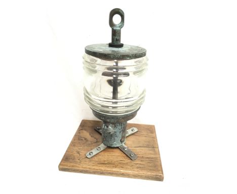 Northern Electric Manufacturers (North Shields) lamp with ribbed glass, height 33.5cm. Mounted on display stand. 