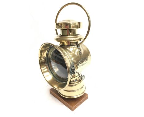 Brown Brothers Ltd. (London) DUCO brass nearside automobile lamp, with burner, clear lens and small red lens to rear. Height 