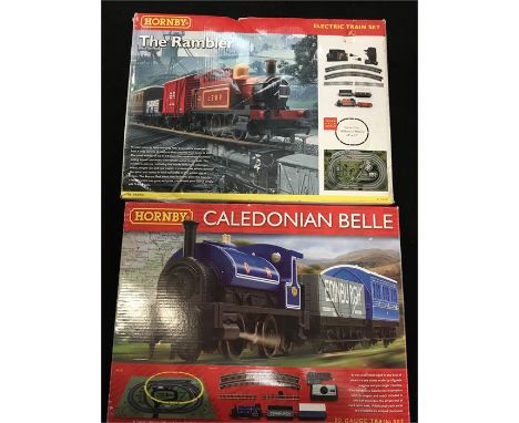HORNBY 2 x Ready to Run Train Sets - R1035 'The Rambler' Set comprising a LSWR Light Brown 0-4-0T # 709 and R1151 the 'Caledo