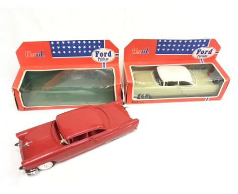 Two Osul 1955 Ford Fairlane 1/18 scale plastic promotional models, one in green with white roof the other in red, length 27cm